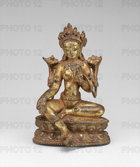 Goddess Green Tara Seated with Hand in Gesture of Gift Giving (Varadamudra), 14th century, Tibet, Southern Tibet, Southern Tibet, Gilt bronze with red pigment and gemstones, 16.9 x 11 x 10.2 cm (6 11/16 x 4 3/8 x 4 in.)