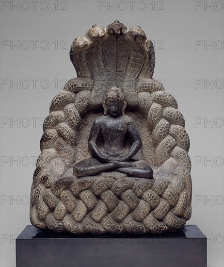 Buddha Sheltered by the Serpent King Muchalinda, 11th/12th century, Nepal, Kathmandu Valley, Kathmandu Valley, Schist, 44.2 x 33.5 x 14.5 cm (17 3/8 x 13 3/16 x 5 11/16 in.)