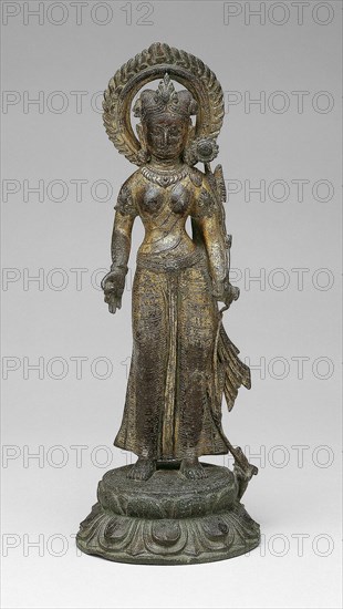 Goddess Green Tara Standing with Hand in Gesture of Gift-Giving (varadamudra), 10th century, Nepal, Nepal, Copper alloy, 28.5 x 19.6 x 10.4 cm (11 5/8 x 7 11/16 x 4 1/16 in.)