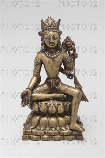 Bodhisattva Avalokiteshvara Seated with Hand in Gesture of Gift Giving (Varadamudra), 8th/9th century, Pakistan, Khyber Pakhtunkhwa Province, Swat Valley, Swat, Brass inlaid with silver, 15.9 x 10.3 x 6 cm (6 1/4 x 4 1/16 x 2 3/8 in.)
