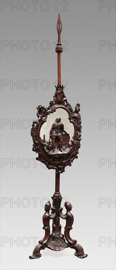 Pole-Screen, c. 1851, Arthur James Jones and Son, Irish, active mid-19th century, Ireland, Dublin, Irish bog yew and mirror glass, brass mount, 222.3 × 45.7 cm (widest point) (87 1/2 × 18 in.)