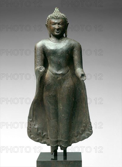 Standing Buddha, Pagan period, 11th/12th century, Burma (now Myanmar), Burma, Bronze inlaid with silver, 47.4 × 21.5 × 10.1 cm (18 11/16 × 8 1/2 × 4 in.)