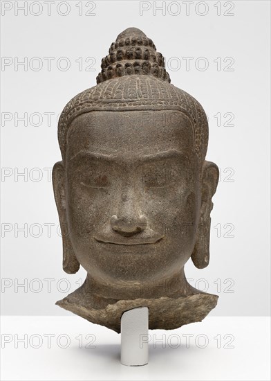 Head of a Buddhist Deity, Possibly Prajnaparamita, Angkor period, late 12th/early 13th century, Cambodia, Cambodia, Sandstone, 36.2 × 17 × 18.1 cm (14 1/4 × 6 11/16 × 7 1/8 in.)