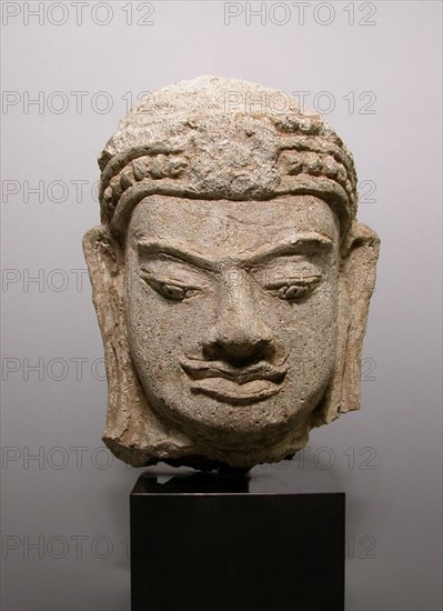 Head of a Male Deity (Deva), Haripunjaya period, 11th/12th century, Thailand, Lamphun Province, Thailand, Stucco, 27.4 x 22.6 x 17.9 cm (10 3/4 x 8 7/8 x 6 15/16 in.)
