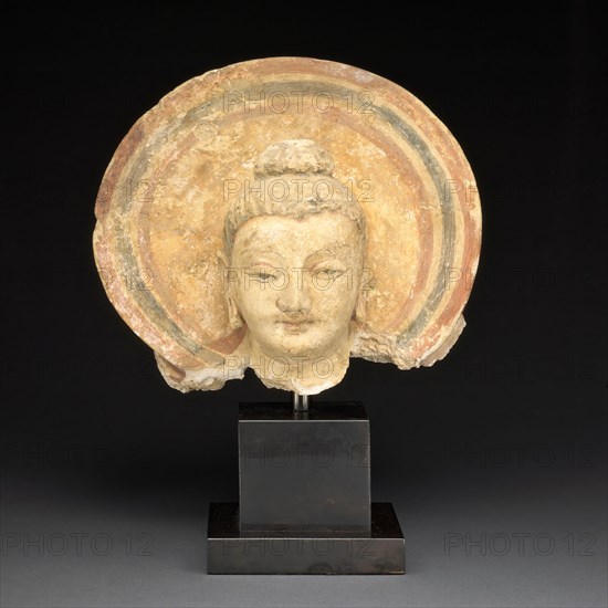 Head of Buddha, 3rd/4th century, Present-day Afghanistan or Pakistan, Ancient region of Gandhara, Gandhara, Stucco with pigments, 18.2 × 22. × 16.1 cm (7 1/8 × 9 × 6 in.)