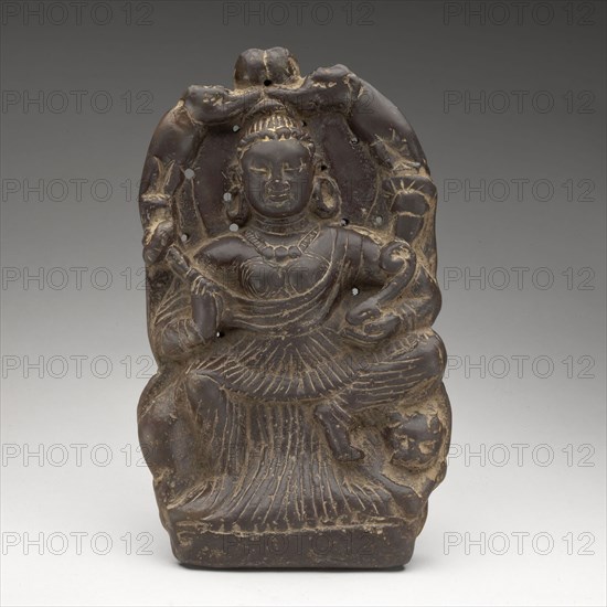 Goddess of Abundance Enthroned on Lion and Lustrated by Elephants, 7th/8th century, India, Kashmir or Pakistan, India, Chlorite, 24.3 x 14.5 x 3.7 cm (9 5/8 x 5 3/4 x 1 7/16 in.)