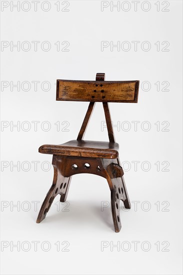 Granville Chair, c. 1870, Designed by Edward Welby Pugin, English, 1834–1875, Made by South East Furniture Company, Ramsgate, Kent, England, Oak and ebony with later iron plate, 82.6 × 55.9 × 45.3 cm (32 × 22 × 17 in.)
