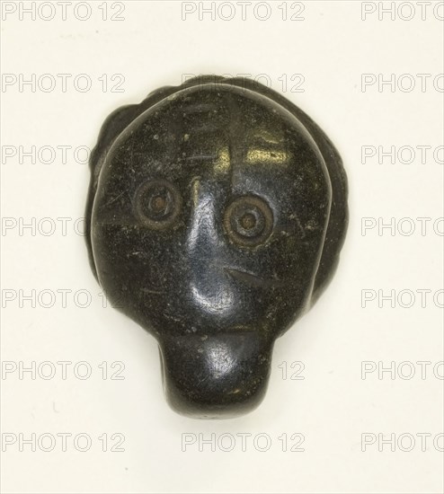 Face Amulet, Coptic Period (4th–7th century AD), Egyptian, Egypt, Stone, 2.2 × 1.9 × 0.6 cm (7/8 × 3/4 × 1/4 in.)