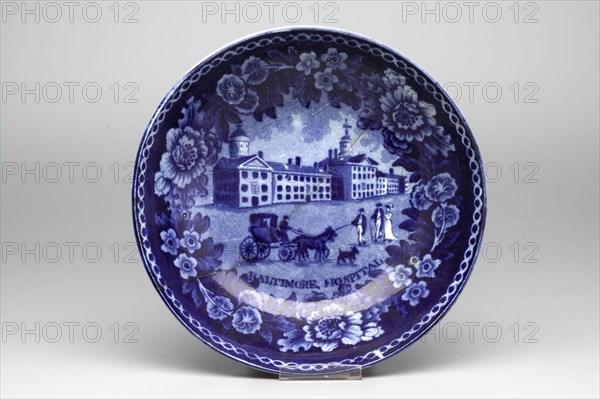 Unknown (English), Baltimore Hospital Saucer, between 1822 and 1832, white earthenware with blue transfer-printed decoration, Overall: 1/4 × 5 7/8 inches (0.6 × 14.9 cm)