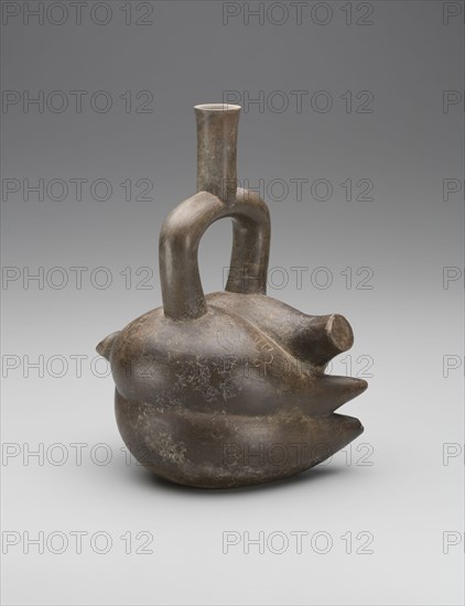 Chavin, Precolumbian, Vessel with Stirrup Spout in the Form of Yucca Root, between 7th and 5th century BCE, Terracotta, Overall: 11 3/8 × 8 5/8 × 6 1/4 inches (28.9 × 21.9 × 15.9 cm)