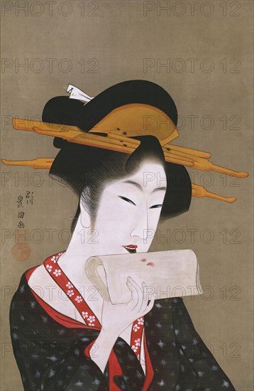 Utagawa Toyokuni I, Japanese, 1769-1825, Beauty Blotting Her Lip Rouge, ca. between 1800 and 1805, Ink and paint on silk, Overall: 63 7/8 × 23 7/8 inches (162.2 × 60.6 cm)