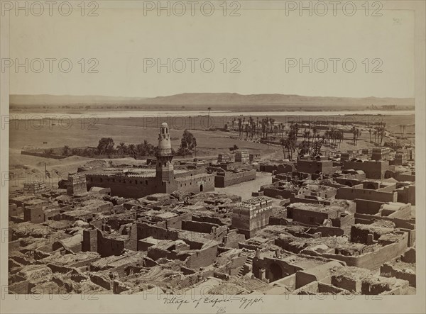Henri Béchard, French, 1869-1889, Village of Edfu, View Taken from the Pylon of the Temple, late 19th century, albumen print, Image: 10 5/8 × 15 1/8 inches (27 × 38.4 cm)
