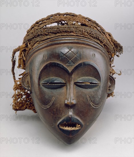 Chokwe, African, Mask (Mwana pwo), early 19th century, carved wood with hemp, Overall: 8 3/4 × 8 1/2 × 7 5/8 inches (22.2 × 21.6 × 19.4 cm)