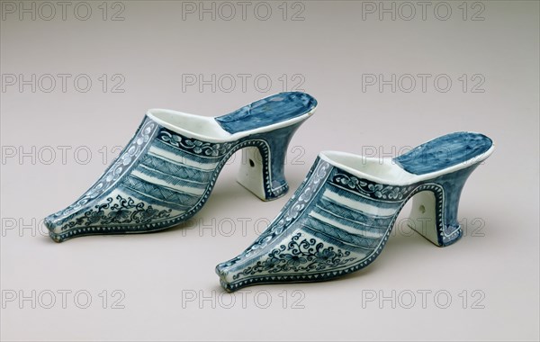 attributed to De Dobbelde Schenckan Factory, Dutch, 1661-1777, Pair of Shoes, ca. 1700, Tin-glazed earthenware with enamel decoration, Overall: 3 × 2 1/8 × 7 inches (7.6 × 5.4 × 17.8 cm)