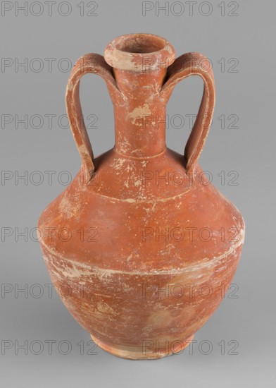 Amphora, unknown Roman workshop, Roman pottery, 1st–2nd century, Rome, Gaul France; vessel amphora; height 14.6 cm, width 9.6 cm 0.146 m × 0.096 m, A worn terracotta vessel with a bulbous body, narrow neck, flared rim, and a pair of high curved handles extending from the neck to the shoulder, showing surface abrasions and patches of lighter wear against the dominant reddish-brown color, set against a plain neutral gray background.