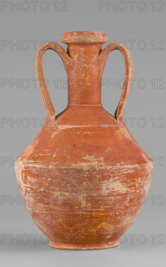 Amphora, unknown Roman workshop, Roman pottery, 1st–2nd century, found in Rome, originating in Gaul France; vessel amphora; height 14.6 cm, width 9.6 cm., A large earthenware vessel with a worn reddish-orange surface and areas of pale scuffing, featuring a rounded body that tapers to a narrow base and rises to a short neck with a flared rim; a pair of curved handles extend from the neck to the shoulder, showing similar reddish-orange color with pale wear, and the background is a uniform gray.