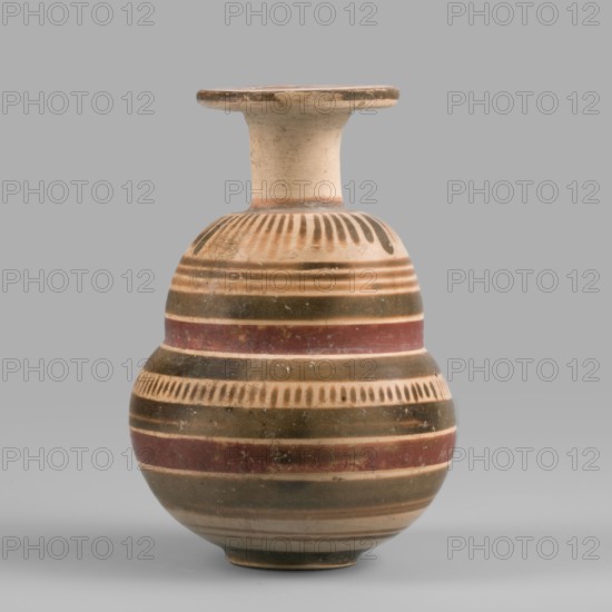 Italo-Corinthian aryballos, geometric motifs, Etruscan pottery, 600–575 BC, Etruria, aryballos vessel, weight 0.054 kg, height 7.7 cm, diameter 5.3 cm, A rounded ceramic vessel with a narrow neck and flared rim sits against a plain gray background; the vessel displays horizontal bands and decorative vertical dash patterns in shades of beige, brown, reddish-brown, and dark olive, with a lighter beige neck and rim and a slightly darker base, and the surface shows subtle wear and small spots of discoloration.