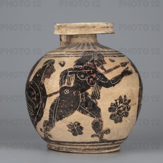 Orientalizing aryballos with a depiction of Hermes, and the Sirens, Otterlo Painter, c. 580–570 BC. Globular aryballos with a wide rim and low neck; foot poorly defined. Decoration covers entire body; radial ornament on shoulders; main field bounded by two thin varnish lines. Walking Hermes, holding a spear between two sphinxes. Precise engraved modelling with many details; sphinx wings and some body parts with red retouch. Small amount of large infill ornamentation. Outer surface of foot covered with varnish; bottom decorated with concentric circles. Technology: matte varnish. Condition: full form but glued; surface contaminated; visible chips and cracks. Clay color 10 YR 8/3 very pale yellow; varnish color 7.5 YR 2.5/1 black; red color 10 R 4/3 weak red. Attributed origin: Corinth, c. 570 BC. Type: aryballos vessel. Height 11.7 cm; diameter 11 cm; weight 0.280 kg; foot diameter 6.5 cm; spout diameter 5.5 cm., A rounded ceramic vessel with a short neck and flared rim sits against a gr...