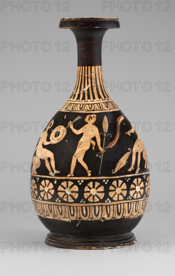 Red-figure bottle with a scene of the punishment of Marsyas;, Between ornamental bands on the lower neck and belly, Marsyas sits on a cloak one end covering his right thigh. His lower torso faces left while his upper body, hands tied to a tree before him, faces right toward Apollo. Apollo stands beside a table on a platform, a lyre on the table and a taenia victory ribbon in his right hand fluttering above Silenus’s head. A Scythian stands before Marsyas holding a knife in his right hand and beginning to flay him. The scene includes three satyrs and a column with an oval object possibly an omphalos. Illustrates the musical agon between Apollo lyre and Marsyas aulos. Red-figure Greek pottery, ca. 330–310 BC. Provenance: Apulia / Basilicate. Bottle vessel. Height 26 cm; width 13.5 cm; weight 0.67 kg., A rounded ceramic vessel with a narrow neck and flared rim, primarily black with light tan painted figures and decorative bands; the neck features vertical tan stripes and an ornamental bor...