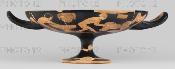Red-figure kylix with a bathing scene, the Boots Painter ca. 460 BC. Bath iconography; Greek ceramics. Physical description: goblet with slightly parted rim edges, shallow bowl, low stem, and flat foot. Vices have a round cross-section, slightly raised tops reaching the line of the rim. Conical bottom. Sleeve-shaped foot. Scene: Women wash at lutrions bowls on high bases, pass around folded garments, and one of them ties the characteristic high boots. Technology: Thick, very good quality varnish, evenly distributed. Smooth surface. Traces of turning invisible, brush marks visible. Mixture: mica. Condition notes: Artifact glued from many fragments; visible conservation restorations; surface contaminated; visible secondary losses and chips; standing surface heavily worn. Provenance/attribution notes: Attributed to the Boots Painter. ca. 460 BC. Attica/Athens/Tarquinia Beazley 1928. Kylix, vessel. Dimensions: height 9.2 cm; width 29.8 cm; depth 22.8 cm; weight 0.53 kg., A shallow, footed ...