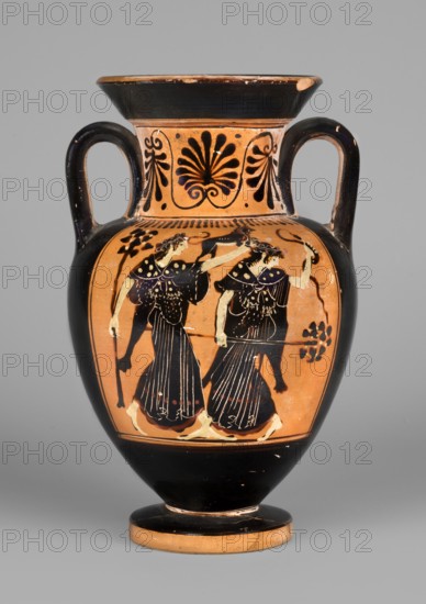 Black-figure neck amphora with a depiction of dancing maenads, The Diosphos Painter ca. 500–475 BC. Depicts Dionysus mythology and maenads. Amphora with a flared spout, cylindrical neck with slightly concave walls distinct from the body; ovoid body tapering downwards; cylindrical foot with straight edges. Handles made of two clay rolls placed under the spout, resting on the shoulders. Flat handles. Recessed bottom, 3.5 cm wide. Technology: Smooth surface, shiny metallic varnish; well-cleaned, homogeneous clay with varnish applied in an even layer. Condition comments: A few secondary surface defects; internal surface contaminated; chip on the spout; glued foot. Clay color: close to 5 YR 6/6 reddish red. Varnish color: 10 YR 2/1 black. Red color: 7.5 R 3/3 dusky red. White color: 2.5 Y 7/2 light grey. Attributed to Kamila Nocon; ca. 500–475 BC; origin: Attica, Athens. Amphora, vessel, weight 0.43 kg., A ceramic vessel with a rounded body, a flared rim, and a footed base, featuring two ve...