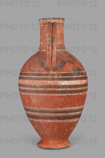 Jug with a figurine of a woman with a jug. Cypriot pottery, female figurine applique. Jug on a foot resembling an inverted echinus with a belly widening by convex shoulders, separated from a cylindrical neck with a straight spout. A two-part vise connects the neck with the shoulders; on the side opposite the vise is the bust of a woman holding a jug. Decoration in white and black paint: the belly at its widest point and along one-third of its height is decorated with alternating white and black concentric bands. Beneath the vise, a wavy black stripe extends onto the shoulders on both sides. On both shoulders are two birds among plants, a row of dots and a concentric stripe at the base of the neck; a branch with leaves encircles the neck above, and black triangles on a white background decorate the edge. Date: 480–400 BC Cypriot — Classical Period I. Origin: Arsinoe Marion. Vessel. Height 35 cm, width 19 cm, weight 1.72 kg., A single ceramic vessel with a rounded body that tapers to a n...