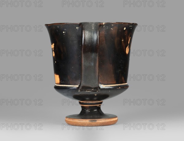 Red-figure kantharos with a depiction of an ephebe with an aryballos and a Greek inscription “Beautiful boy”., Kantharos with a slightly flared spout, a deep bowl, a flat bottom, a high profiled stem, a ring-shaped foot. Thin-walled. A: bearded man with a lyre in his head in left profile, holding a lyre in his left hand. B: ephebe with aryballos. The inner surface of the bowl is covered with varnish. Technology: Smooth surface. The varnish is thick, shiny, unevenly fired. Notes: the vessel is intact. Small secondary losses and chips are visible on the surface. Varnish color: 10 YR 2/1 Black. Date: ca. 450 BC mid-5th century BC. Place of origin: Attica. Object type: kantharos vessel. Dimensions: height 11 cm, width 16.2 cm, depth 10.2 cm., A single ceramic cup with a stemmed base sits centered on a neutral gray background; the cup has a flared rim, a straight central handle running down the front, and a rounded foot. The surface is predominantly black with worn areas revealing a warm te...
