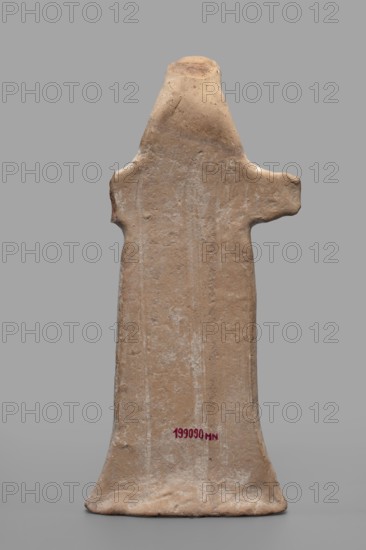 Idol with a full-bodied female head, standing female figure with a torso flattened on both sides and a plastically developed head slightly tilted forward. Dressed in a long robe, highlighted by geometric polychrome patterns. The face is plastically modeled and slim with a long narrow nose, a large straight mouth with lips slightly parted in a smile, a sharp chin, slim cheeks with prominent cheekbones, large convex almond-shaped eyeballs, a broad eyebrow arch and a high forehead. Hair arranged symmetrically, parted in the middle, slightly crimped into a swallowtail, long hair falling over the shoulders. Slightly defined wide neck. Hands represented by wide projections extending to the sides with ends slightly curved forward. Dress flared at the bottom forming a base for the figurine. Traces of white and red polychrome visible throughout; on the robe they form a barely visible outline of geometric patterns—braids and checks. c. 550 BC formerly dated mid-6th century BC, Boeotia, sculpture...