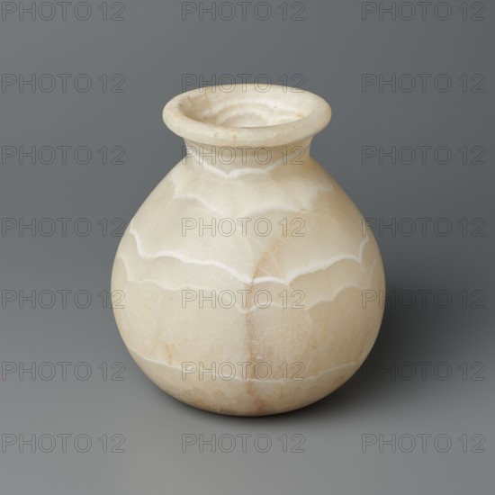 Vessel, unknown creator; globular stone vessel with a short, wide neck and a large upturned spout, flattened bottom; ca. 1550–1069 BC, New Kingdom, Egypt; vessel; height 14.8 cm, width 13.4 cm, weight 1.32 kg., A rounded, bulbous vessel with a flared rim sits against a smooth background; the vessel's surface shows layered, wavy banding in creamy beige and off-white tones with subtle veins of light tan and faint amber, and its texture appears smooth and slightly translucent in places.