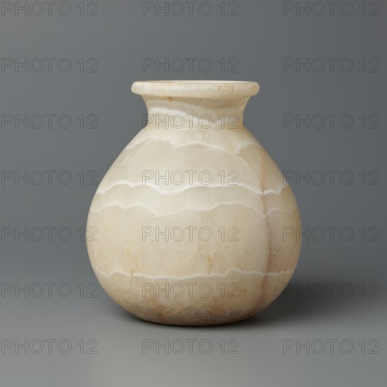 Vessel, globular vessel with a short, wide neck and a large upturned spout, flattened bottom, stone, ca. 1550–1069 BC New Kingdom, Egypt, vessel, height 14.8 cm, width 13.4 cm, weight 1.32 kg, A rounded, bulbous vase with a short, flared neck sits against a smooth background; the vase shows banded, cloud-like layers in shades of cream, beige, off-white, and pale tan with subtle variations and a few slightly darker brownish streaks, and the surface appears polished with faint translucent veining and a soft sheen.