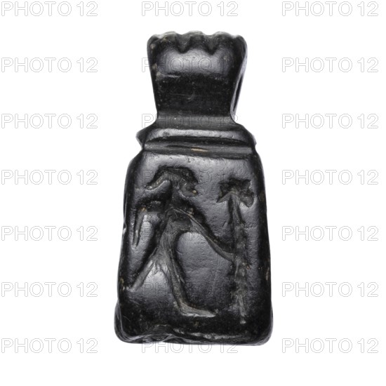 Stamp seal with figural representations. Glyptic stamp seal in the form of a truncated pyramid on a square base, terminated with a round handle. The four side walls and the base are decorated with engraved, stylized figurative representations. Two opposite sides depict a rider on a horse; one of the other sides depicts a striding figure holding a staff topped with a star; the opposite wall depicts an animal being attacked by a bird of prey. A winged animal is engraved on the seal's base. Iron Age, 9th–6th century BC. Northwestern Syria; Near East. Seal. Height 2.8 cm; width 1.3 cm; depth 1.4 cm. Impression carrier dimensions: length 8.5 cm; width 4.4 cm., A small carved object with a glossy dark surface, predominantly black with a few tiny lighter flecks, shown against a white background. The object has a wider base tapering upward to a narrower top with a scalloped edge. The front face features shallow carved lines forming abstract shapes or figures, including curved and angular incis...
