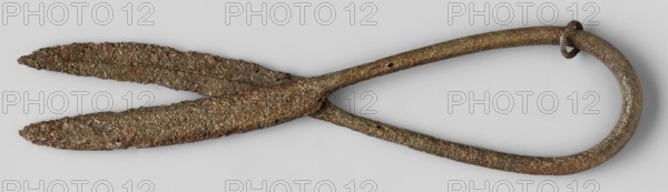 Scissors, unknown Roman workshop; maker/workshop unspecified; tailoring accessories. Scissors with elongated blades and a rounded handle. 2nd–3rd century, Roman Empire 27 BC–476. Tool; weight 40 g., An elongated metal object with a looped handle and crossed blades, showing a rough, pitted surface texture; the object displays mottled colors including brown, dark brown, rusty red, and touches of gray, with irregular edges and a granular, corroded appearance.
