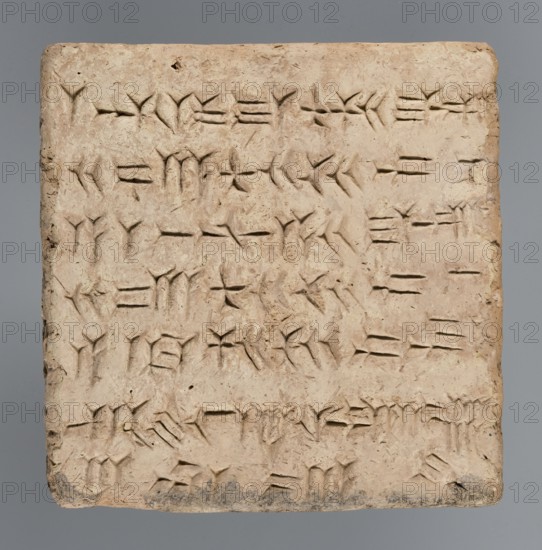 Brick with an inscription of King Shalmaneser III, Shalmaneser III 858–824 BC author Shulmanu-ašared, king of the Neo-Assyrian Empire, Calah Iraq capital of the Neo-Assyrian state, the ziggurat at Kalhu commonly known as Nimrud, bricks with cuneiform inscription. Square brick. The upper surface is inscribed over almost its entire surface with seven lines of carefully impressed cuneiform characters. Sand-colored clay, one edge burnt to black. 858–824 BC. Kalhu place of origin, Nimrud place of finding. Brick; weight 20.97 kg; width 35 cm; length 35 cm; thickness 12 cm., A square, flat clay tablet with incised markings across its surface sits against a neutral gray background; the tablet is a pale beige to light tan color with subtle variations and a few darker smudges near its bottom edge, and its edges are slightly rounded and chipped in places; the incisions form repeated angular, wedge-shaped impressions that create a dense pattern across the face, with some shallow depressions and sm...