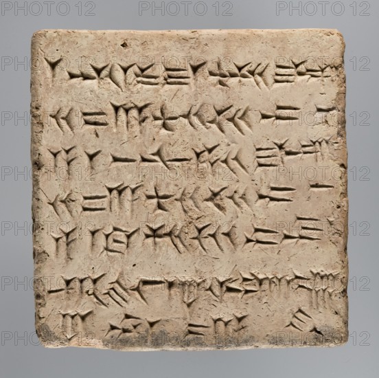 Brick with an inscription of King Shalmaneser III, Shalmaneser III 858–824 BC creator Shulmanu-ašred, king of the Neo-Assyrian Empire; Calah Iraq, the ziggurat at Kalhu commonly known as Nimrud; square brick with cuneiform inscription. The upper surface is inscribed over almost its entire surface with seven lines of carefully impressed cuneiform characters. Sand-colored clay, one edge burnt to black. Date: 858–824 BC. Place of origin/finding: Kalhu Nimrud. Material: brick. Weight: 20.97 kg; width 35 cm; length 35 cm; thickness 12 cm., A rectangular clay tablet with a rough, textured surface in beige and light tan tones set against a muted gray background, featuring a grid of incised wedge-shaped marks and linear impressions forming repeated patterns across the face, with slightly darker shadows within the indentations and a few small chips and worn edges, particularly along the top and bottom, and subtle variations of beige, tan, light brown, and gray on the tablet surface.