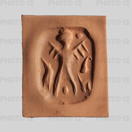 Stamp seal. Rectangular stamp seal with a handle in the form of a protruding ridge along the axis of the seal with a crosswise drilled hole. On a rectangular base with rounded corners is a schematic representation of a demon, in human form and with wings instead of arms. Unspecified filler elements are on the sides of the demon. Demons; glyptics; stamp seals; Eastern Gallic Scenics. c. 1650–c. 1350 BC, Late Bronze Period. Northwest Syria place of manufacture; Near East place of find. Material: seal. Dimensions: height 1.7 cm, width 4.2 cm, depth 3.2 cm., A rectangular terracotta-colored clay plaque with a recessed, irregular oval area containing a raised, stylized human-like figure with outstretched arms and elongated legs, surrounded by a few abstract carved shapes; the background around the plaque is light gray.
