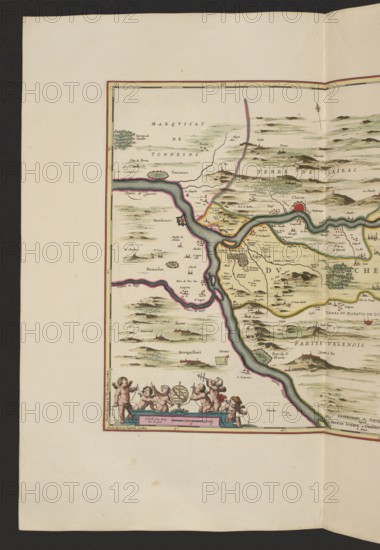 Le duché d'Aiguillon, Schenck, Pieter 1660–1711 creator / publisher, Valck, Gerard 1651/1652–1726 creator / publisher; France; map; cartography; Lot river; Garonne river; 1711; Amsterdam; map; height 40.0 cm; width 49.4 cm, The image shows a section of an old decorative map with a pale beige background and a darker beige border, featuring a winding blue-green river edged with a pink outline, surrounded by tan and green landscape shading and small illustrated hills and clusters of trees in green and brown. Along the river and across the map are small stylized buildings and walled towns depicted in red, brown, and gray, and thin black lines suggesting roads or borders highlighted in yellow and pink. In the lower left corner there is a decorative cartouche populated by several nude cherub-like figures rendered in flesh tones with brown hair, playing with a gold-colored armillary sphere and holding small objects, all set on a blue and pink ornamental base. The overall palette includes beig...