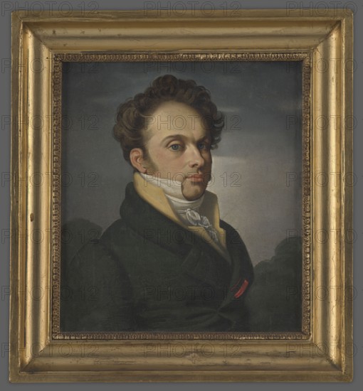 Andrzej Walenty Radziwill 1780–1837, unknown painter. Bust, three faces to the left. Dark, combed hair, sideburns. Dressed in a dark jacket and a cream vest with high collars. Around his neck is a white scarf, under it a white collar. In the background, a landscape with trees illuminated by moonlight. Early 19th century. Portrait. Height 28.4 cm, width 25.1 cm., A framed painted portrait of a man shown from the chest up wearing a dark coat with a high collar and a pale scarf tied at his neck, his face turned slightly to one side with curly brown hair and sideburns; the background is a muted gray with softer darker shapes behind him. The frame around the painting is metallic gold with an inner decorative trim in a darker gold tone. Visible colors include brown, dark green, black, beige, cream, pale yellow, gray, and gold, with a small spot of red on the coat.