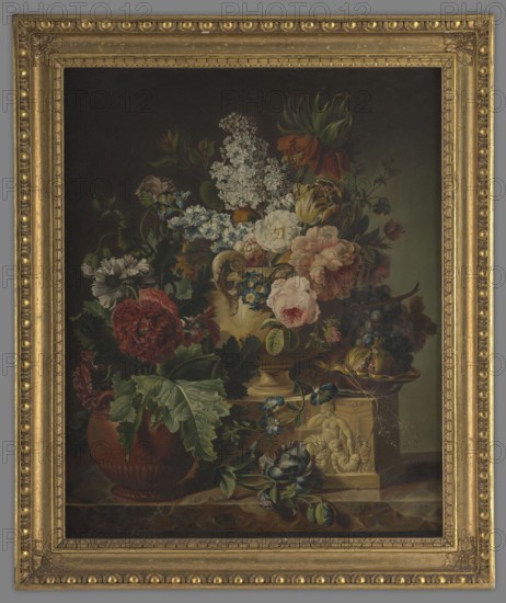 Flowers in stone vases, end of 18th century, painting; height 84.5 cm, width 68.5 cm other measurements: height 86 cm, width 70 cm., A framed still life painting showing a large ornate gold frame surrounding a dark background with a central arrangement of flowers and decorative objects; the flowers include roses and other blooms in colors such as red, pink, white, yellow, blue, and orange, with green leaves and stems; a few large leafy green plants sit in a reddish-brown pot, and a decorative vase with yellow and blue accents holds part of the bouquet; a carved stone or plaster pedestal with sculpted figures supports some of the arrangement, and a shallow dish nearby contains dark purple and blue grapes and a yellowish fruit; the composition also contains small blue flowers, darker foliage, and subtle highlights against the deep brown and black background.