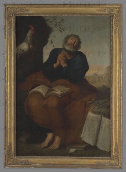 Saint Peter Praying, 19th century, painting, height 117.0 cm, width 78.0 cm. Saint Peter is seated with an open book on his lap, hands folded in prayer. To the right lie books and keys; to the left a rooster crows., A framed oil painting showing an older bearded man seated with hands clasped and head tilted upward, wearing a dark blue upper garment and a brownish robe that drapes over his legs; an open book rests on his lap and a group of additional books or large pages lies beside him, one propped open, while a white rooster stands on a dark area to the left near some foliage. The scene includes a muted sky and distant landscape in the background with tones of blue, gray, and warm peach, and the visible colors in the image include blue, brown, white, gray, black, green, and gold from the ornate frame.