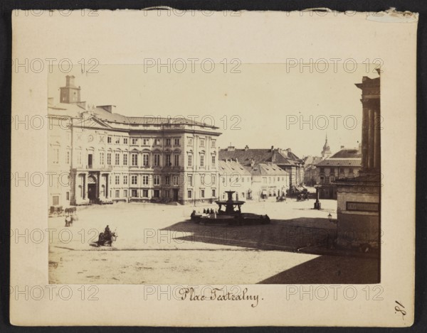 Theatre Square View of the Town Hall and Blanka Palace from Wierzbowa Street towards Castle Square, Karol Beyer 1818–1877. Photograph, photographic print 6.2 × 9.3 cm backing 11.3 × 8.8 cm. Depicts fountains, Town Hall Warsaw; 1818–1944, streetlamps, Blanka Palace, Theatre Square, fire brigade, Senatorska Street, Grand Theatre, Jablonowski Palace. 1861–1863. Nature photography., A sepia-toned photograph showing a broad open square bordered by large multi-story classical buildings with rows of windows and decorative facades, a group of smaller pitched-roof buildings in the background, and a fountain with a low basin and central tiered structure in the middle distance where a few people are seated. The foreground shows a paved expanse with a couple of solitary figures and a seated person near a small cart, while the right side includes a tall columned structure casting a long shadow across the square. Visible colors are sepia/brown tones, beige, dark brown, and off-white.