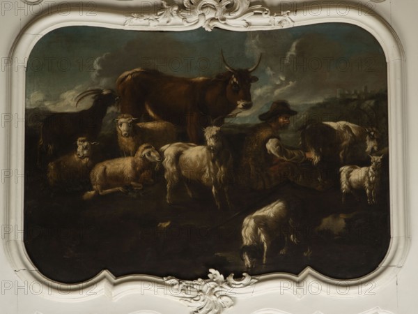 Shepherd's Scene with a Shepherd Milking a Goat, Philipp Peter Roos Rosa di Tivoli 1657–1706. Overall tones are browns and dark blues. The surface is fully composed; focal point is a cow standing at the back and a group of five animals three sheep and two goats filling the right side. On the right, a seated shepherd in a sheepskin coat and hat milks a cow into a wooden bucket. Next to a goat is a small white kid. At the front a dog laps water from a shallow pond. In the right background, city buildings are visible on a hill; the dark sky is covered with puffy clouds. In the upper corner is the Temple of the Sibyl in Tivoli. Several identical faces of sheep and rams appear. Attributed to Philipp Peter Roos born August 30, 1657, Sankt Goar; died January 17, 1706, Rome. 18th century, Italy. Overdoor; height 91.0 cm, width 127.0 cm., A painted scene framed by an ornate white decorative border shows a group of farm animals and a seated man; the animals include several sheep and goats with w...