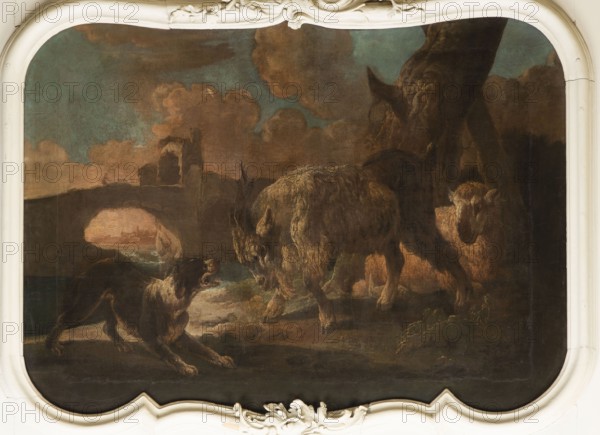 A dog scene with a dog barking at a goat, Roos, Philipp Peter 1657-1706 painter. The general tone of light browns and shades of pink with cumulus clouds, the glow of the last plane beyond the arcade of the bridge with ruined buildings surrounds the view of urban buildings by the river. In the foreground, a dog barking at a goat that is attacking it; on the right side, a sheep lying near a tree trunk. 18th century, Italy; overdoor; height 90.0 cm, width 115.0 cm., A framed painting showing a dark, moody outdoor scene with a large animal facing a dog-like creature, a few other animals nearby, and a distant arched bridge or ruin under a cloudy sky; dominant colors include brown, dark green, muted blue, beige, and black.