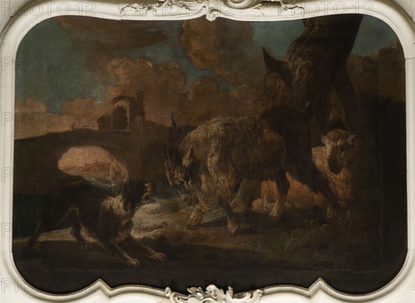 A dog scene with a dog barking at a goat; general tone of light browns and shades of pink with cumulus clouds; the glow of the last plan beyond the arcade of the bridge with ruined buildings surrounds the view of urban buildings by the river. In the foreground, a dog barking at a goat that is attacking it; on the right, a sheep lying near a tree trunk. Roos, Philipp Peter 1657–1706, 18th century, Italy; oil overdoor; height 90.0 cm, width 115.0 cm., A painted scene shows a dark brown and black dog facing a group of shaggy, woolly animals with coarse fur, one prominent animal standing with its head lowered and another partially visible behind a tree, all set on a muted landscape with a rocky foreground and a distant stone archway. The sky contains a mix of teal, muted blue, and brownish clouds, and the scene includes earthy greens and browns in the ground and foliage. The composition is framed by an ornate cream-colored decorative border with curving carved details.