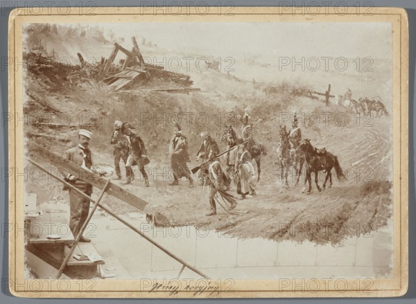 Wojciech Kossak standing on scaffolding beside a section of the Raclawice Panorama canvas depicting the escorting of Russian prisoners of war; photographic print photography from nature, print glued to cardboard backing, ca. 1893–1894; photographer, image shows painting in artists' studios with painting accessories and portraits of artists; dimensions of photographic print: 11.9 cm × 17.1 cm; backing: 13.5 cm × 18.5 cm., A sepia-toned scene shows a group of people and horses on a rough hillside landscape with broken wooden structures and scattered debris in the background; several figures on foot wear varied clothing including coats and headgear, some carrying long poles or rifles, while a few mounted riders sit on dark and light horses; in the foreground a man in a light hat and jacket stands beside a wooden easel or scaffold and a worktable with papers and small objects; the ground is uneven with patches of grass and dirt, and the overall palette includes shades of brown, beige, crea...