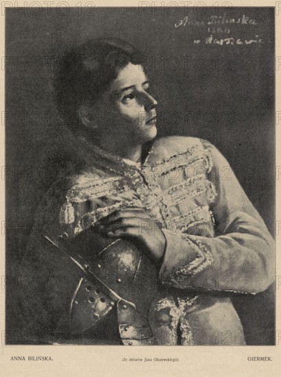 Reproductions of sculptures and bas-reliefs: Jan Biernacki — Monument of Mikolaj Glinka; Portrait of the artist-painter Bogdanski; Monument of Aleksander Makowiecki; Girl, study. Press illustration, 1909. Creator: Jan Antoni Biernacki 1879–1930. Polish sculpture; print reproduction of artworks., A portrait of a person seen from the waist up wearing an ornate jacket with decorative trim and holding a metallic helmet, the person gazes upward and to the side with a contemplative expression, dark hair is short and styled close to the head, the jacket and helmet show textured highlights and shadows, the background is dark and plain, visible colors include shades of black, gray, off-white, and muted beige.
