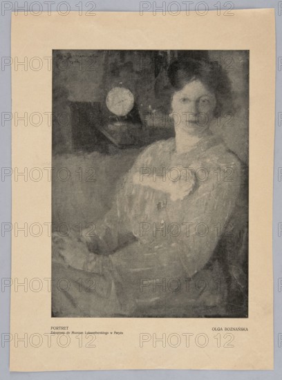 Reproduction of a painting: Olga Boznanska 1865–1940, Portrait; painting, Polish painting, Boznanska, Olga 1865–1940 - reproduction, women, women's portraits, portraits, after 1865; press illustration, reproduction of a work of art; illustration: height 25.9 mm, width 19.0 mm; sheet: height 34.8 mm, width 25.4 mm, A grayscale image of a seated woman shown from the waist up, wearing a textured dress with a light decorative element near the chest; she has dark hair pulled back and a neutral expression. The background is darker with an indistinct round object and rectangular shapes behind her. The image is centered on a beige sheet with a visible border and light gray surrounding area. Colors visible include shades of gray, black, beige, and light gray.