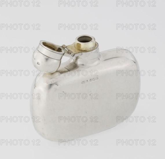 Hip flask by James Dixon & Sons Sheffield; goldsmiths; fl. 1806–, silver hip flask; smooth, cuboid with rounded edges, narrow neck with a spherical hinged stopper. Engraved JAN / TRUE FRIENDS. 1925/1926. Sheffield, England. Vessel. Height 9.9 cm; width 9.6 cm; depth 2.6 cm; weight 110 g. Function: alcohol vessel; material: silver., A smooth, rounded metal flask with a hinged, cup-like cap positioned open at the top sits against a plain light background; the flask and cap have a reflective silver surface with areas of subtle tarnish and faint scratches, and there is a ring of warm golden brass around the flask opening while the inside of the cap shows a similar golden tone.