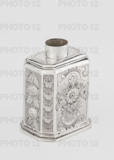 Tea caddy by Nash, Bowles fl. 1720–ca. 1725, goldsmith; rococo style. Cuboid tea caddy with a circular domed lid and a bowl on the top; chamfered side edges; movable, slide-in bottom. Surface decorated with repoussé ornament with floral and rocaille motifs on a grained background; front with an oval rocaille cartouche topped with an eagle, containing an engraved inscription: KENNETH Mc LEOD, / to his much loved Sister / ANNE ZABA, / Oct 23 rd 1848; back with a bouquet of flowers; sides with blooming, leafy roses. Engraved S on the bottom. Dates: 1723/1724 tins; ca. mid-19th century decoration. Place of origin: London, England, Great Britain. Material/type: vessel for loose-leaf tea. Dimensions: height 12 cm, width 7.7 cm, depth 5.7 cm; weight ca. 230 g., A silver-colored metal container with an octagonal shape and a short cylindrical neck at the top, standing on a stepped base; the upright panels are decorated with ornate, raised floral and foliate designs and textured backgrounds, sho...