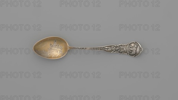 Souvenir spoon, Mechanics Sterling Co Attleboro; goldsmith's firm; fl. 1896–1955. Souvenir spoon with ovoid scoop, gilded, decorated with an engraved representation of a Victorian-style building resembling a French chateau, built on a rock in 1896 burned down in 1907 with the inscription in italics SAN FRANCISCO CLIFF/HOUSE; a widening handle with a profiled edge decorated with a relief ornament on both sides, on one side an inscription along the handle CALIFORNIA 1849 adoption of the California Constitution and the beginning of the gold rush, above it a gold prospector; in the finial a bear symbolizing the state of California; on the reverse fruit characteristic of California, in the finial the state emblem — a seated Minerva, next to her a lying bear, in the background a landscape. Date: 1896–1907. Place of origin: Attleboro, United States of America. Materials/type: cutlery; gilded. Dimensions: length 10 cm, width 2 cm, weight 5 g. Maker: Mechanics Sterling Co., A single decorative ...