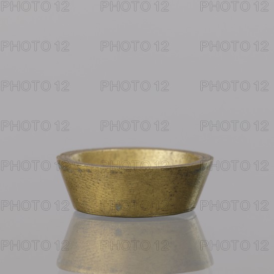 Gwicht; maker, Szewczykowski, Roman 1849–1901, in the shape of a truncated cone; marked inside 1; weight 12.8 g; 18th century; Europe; Germany, Berlin; height 0.9 cm; width 2.6 cm., A small shallow metallic bowl with a tapered sides and a slightly rounded rim sits centered against a smooth neutral background, showing a brushed, worn surface with small spots and scratches; the bowl and its faint reflection on the surface below appear in shades of gold and brass, while the background is a soft gray.